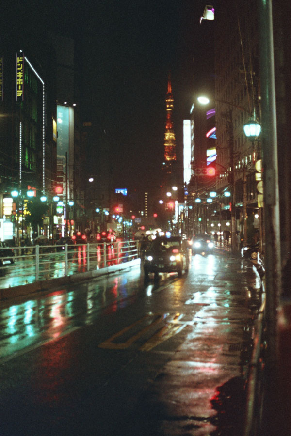 Rainy Tokyo at night with Tokyo tower in the distance