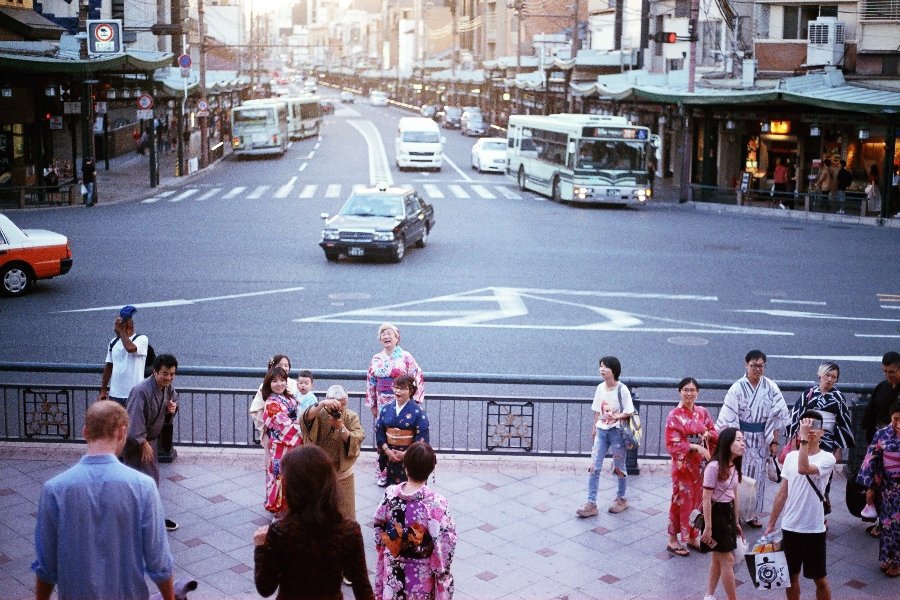 A crowd gathered outside a temple in Kyoto