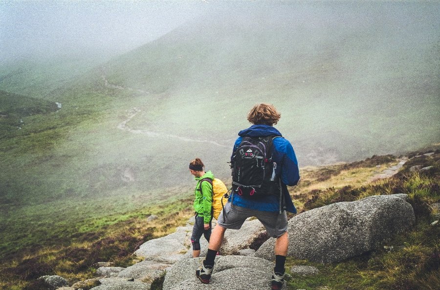 Two hikers descending the Mourne Mountains